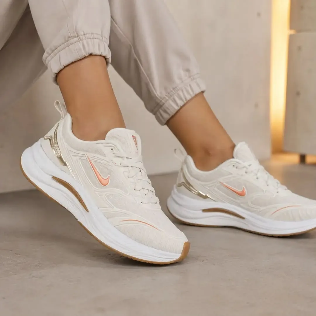 Nike feminino off white e dourado